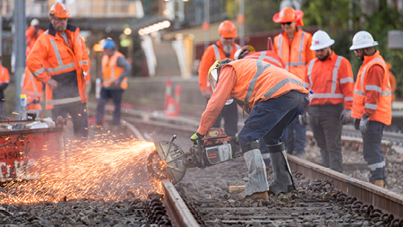 workers on track 